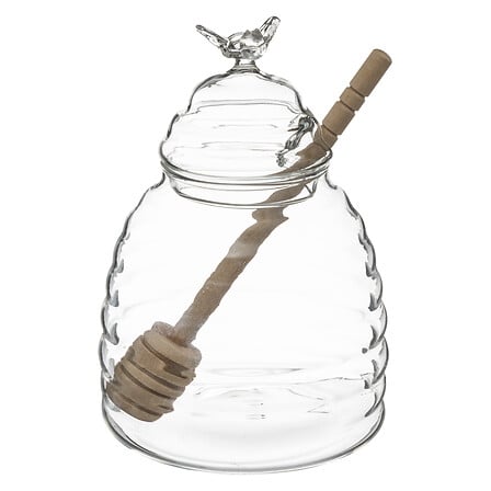 Tarro de miel de cristal con cuchara de roble
