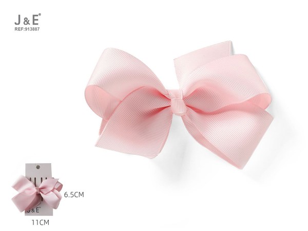 Pinza con lazo ±11*6.5cm rosa